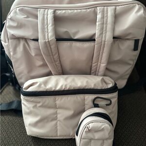 Calpak Luka Duffle, belt bag and key pouch in Rose Quartz